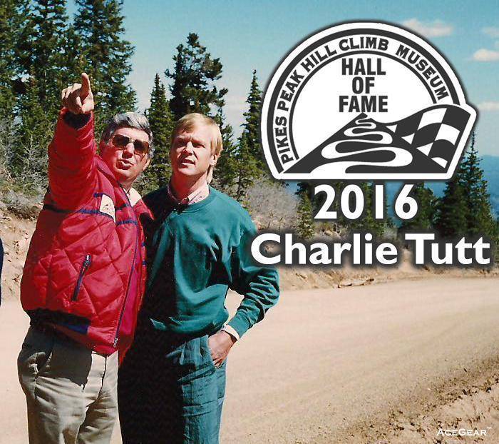 Left to Right: Charlie Tutt describing Pikes Peak and the race course to 1988 King of the Mountain Ari Vatanen.